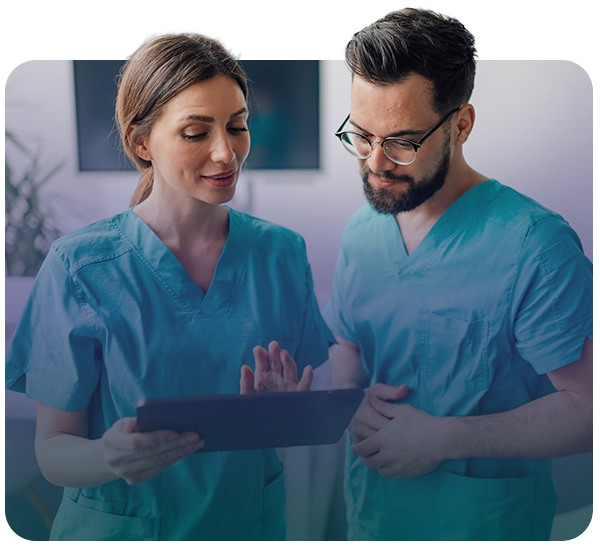 doctors or nurses reviewing info on a tablet