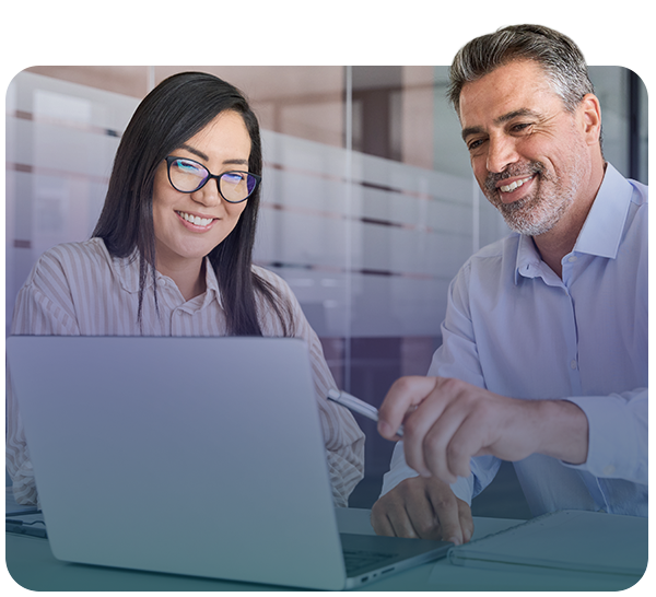 Professionals meeting and reviewing information on laptop