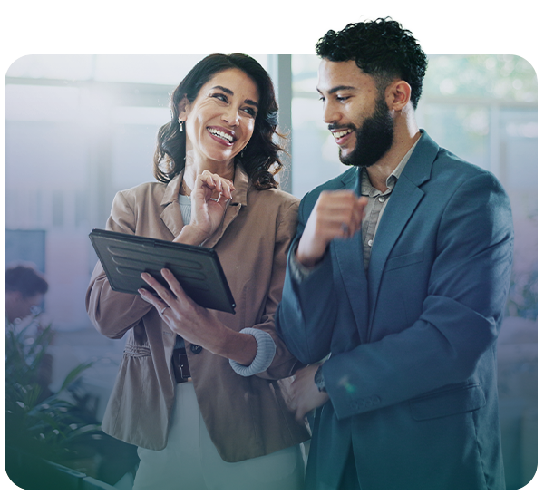 business professionals reviewing info on a tablet