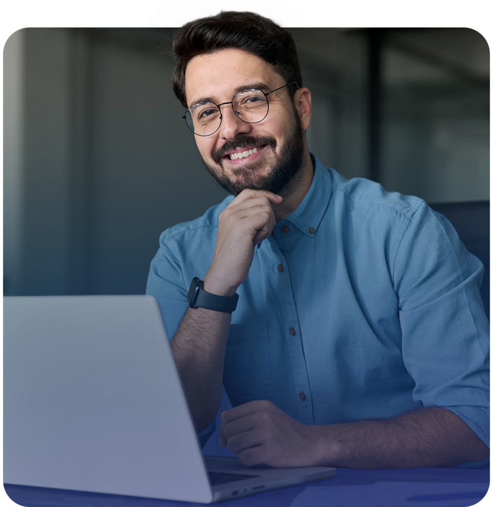 Man smiling with laptop
