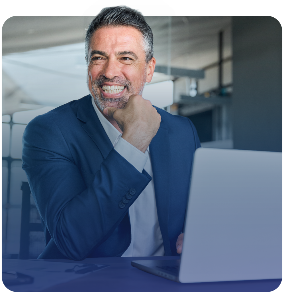 Business man with laptop smiling in meeting room