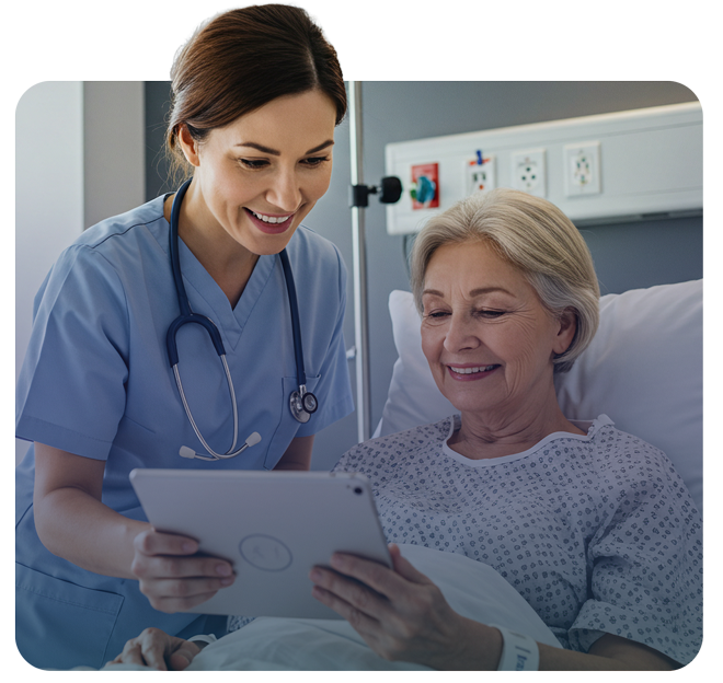 Female clinician and female patient smiling while looking at tablet