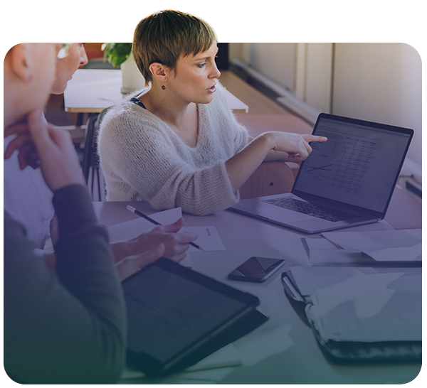businesswoman reviewing information on laptop