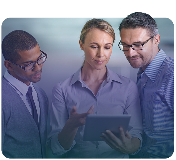 Business associates huddled around tablet