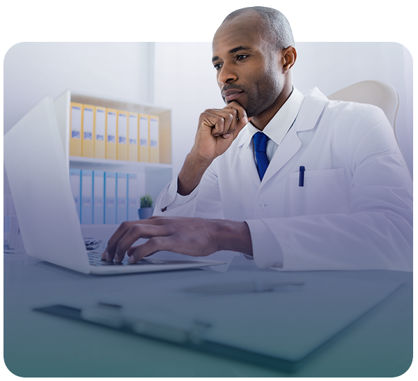 Doctor looking at laptop