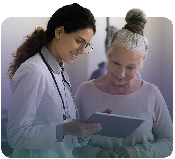Female doctor and patient looking at tablet