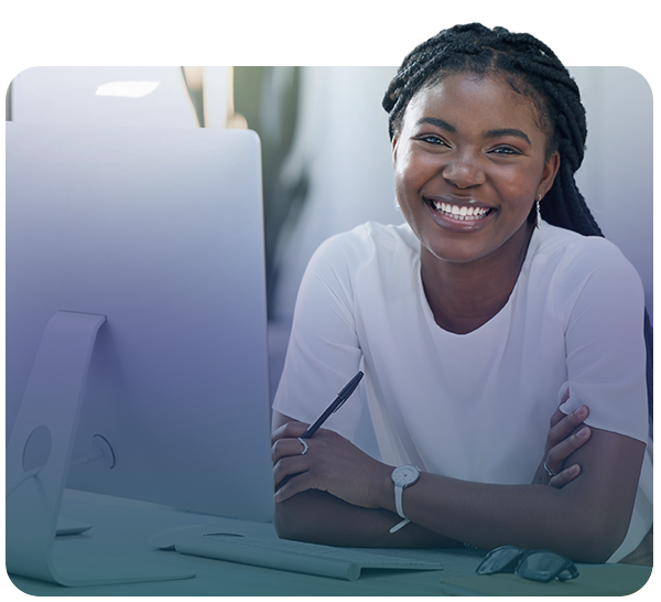 smiling woman working on computer
