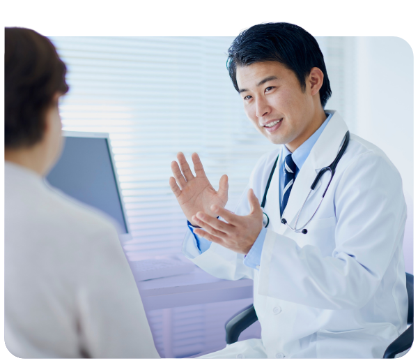 Male clinician explaining something to patient