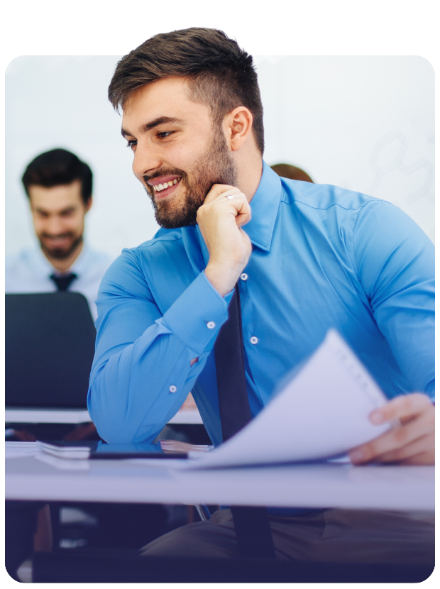 Smiling businessman in meeting